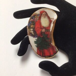 Vintage Ceramic hand-crafted Santa brooch.